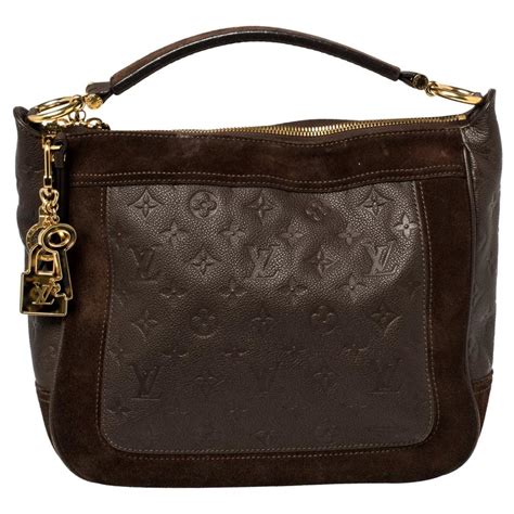 louis vuitton empreinte audacieuse pm monogram leather handbag